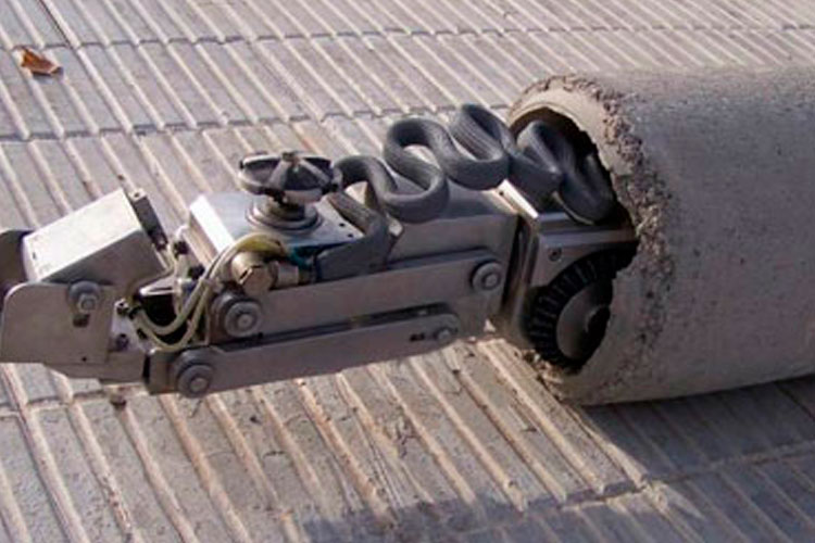 Reparación mediante robot fresador